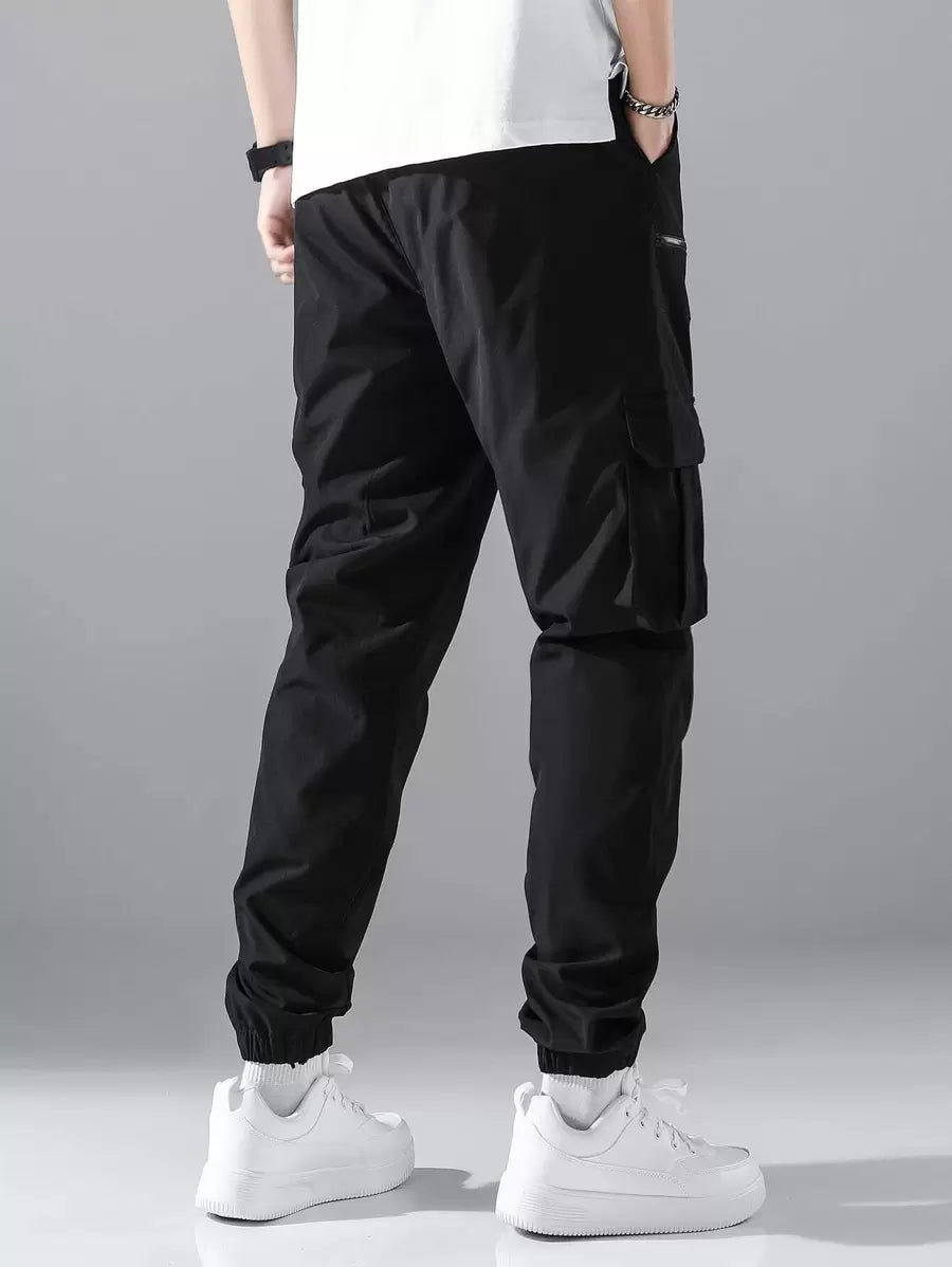 Pantalon cargo ample avec poches à rabat et cordons de serrage pour homme