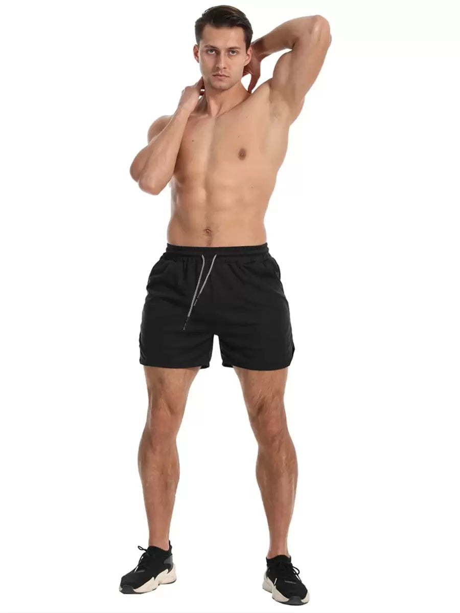 Shorts de sport avec fente, taille élastique et poche pour téléphone pour hommes