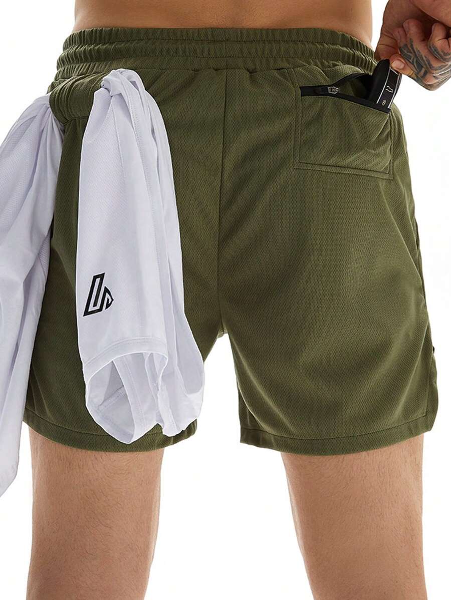 Shorts de sport avec fente, taille élastique et poche pour téléphone pour hommes