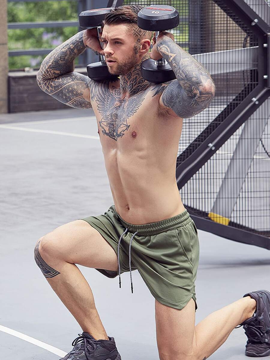 Shorts de sport avec fente, taille élastique et poche pour téléphone pour hommes