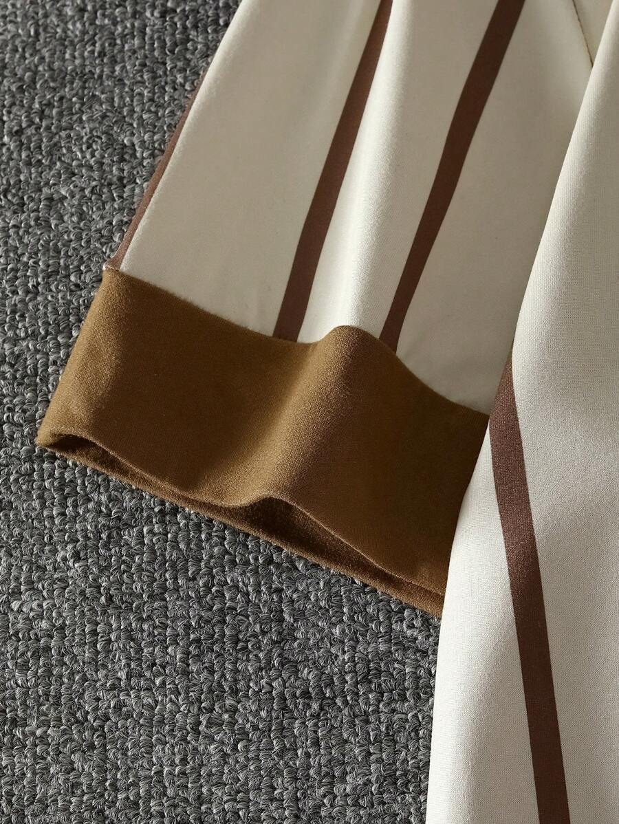 Chemise décontractée à manches courtes et rayures, col rond et coupe ample