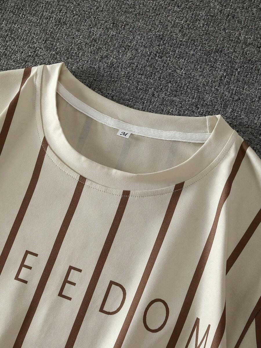 Chemise décontractée à manches courtes et rayures, col rond et coupe ample