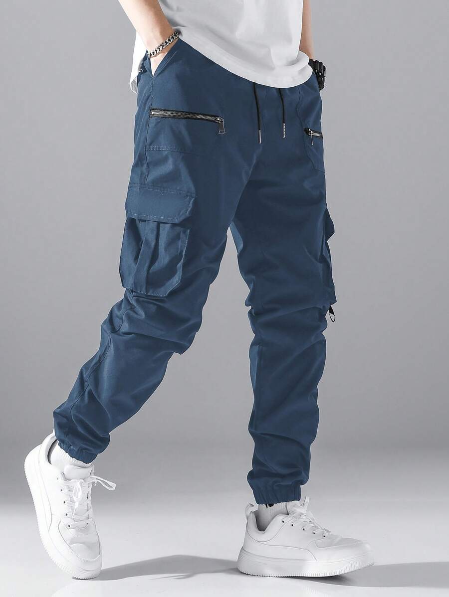 Pantalon cargo ample avec poches à rabat et cordons de serrage pour homme