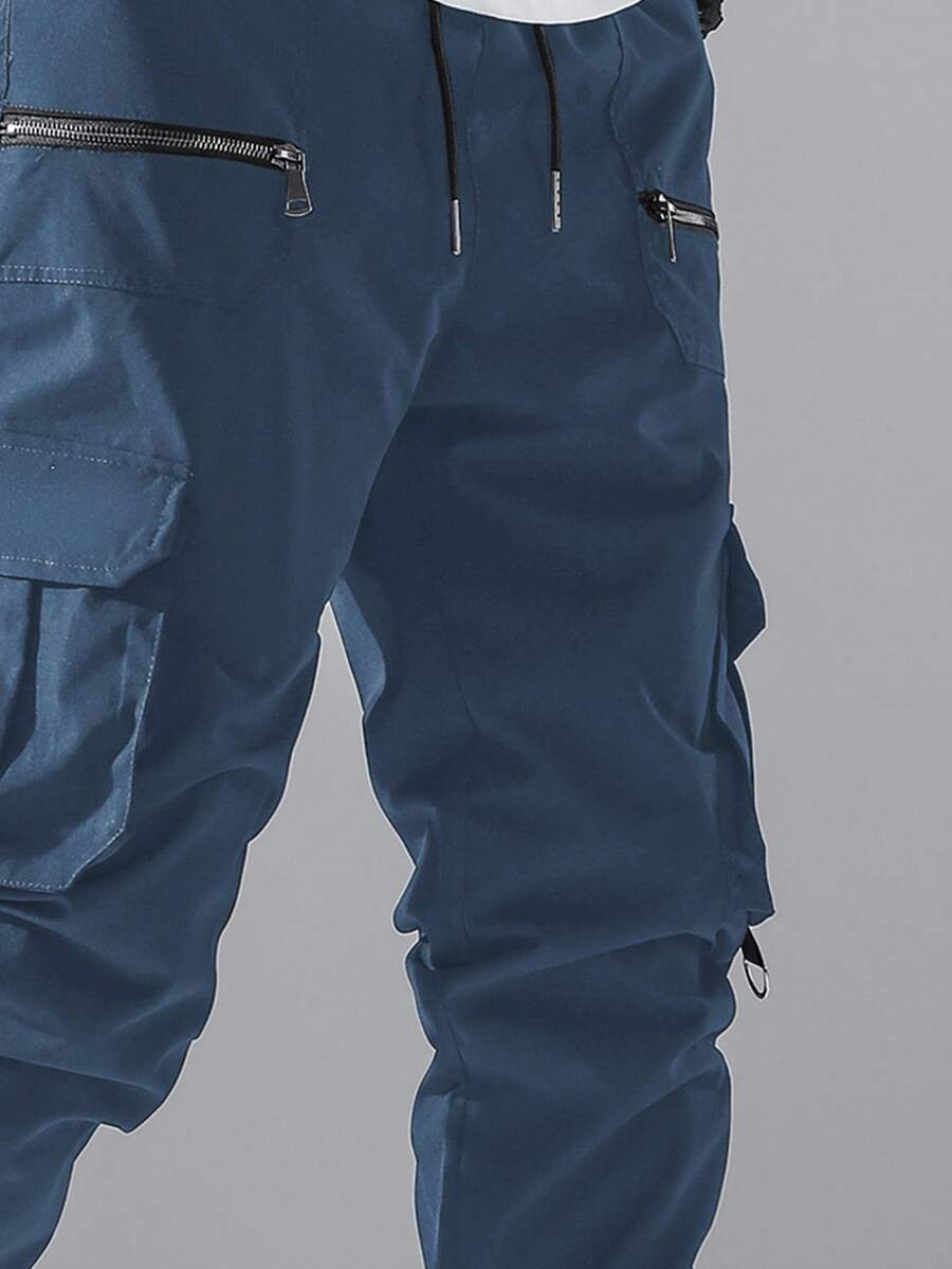 Pantalon cargo ample avec poches à rabat et cordons de serrage pour homme