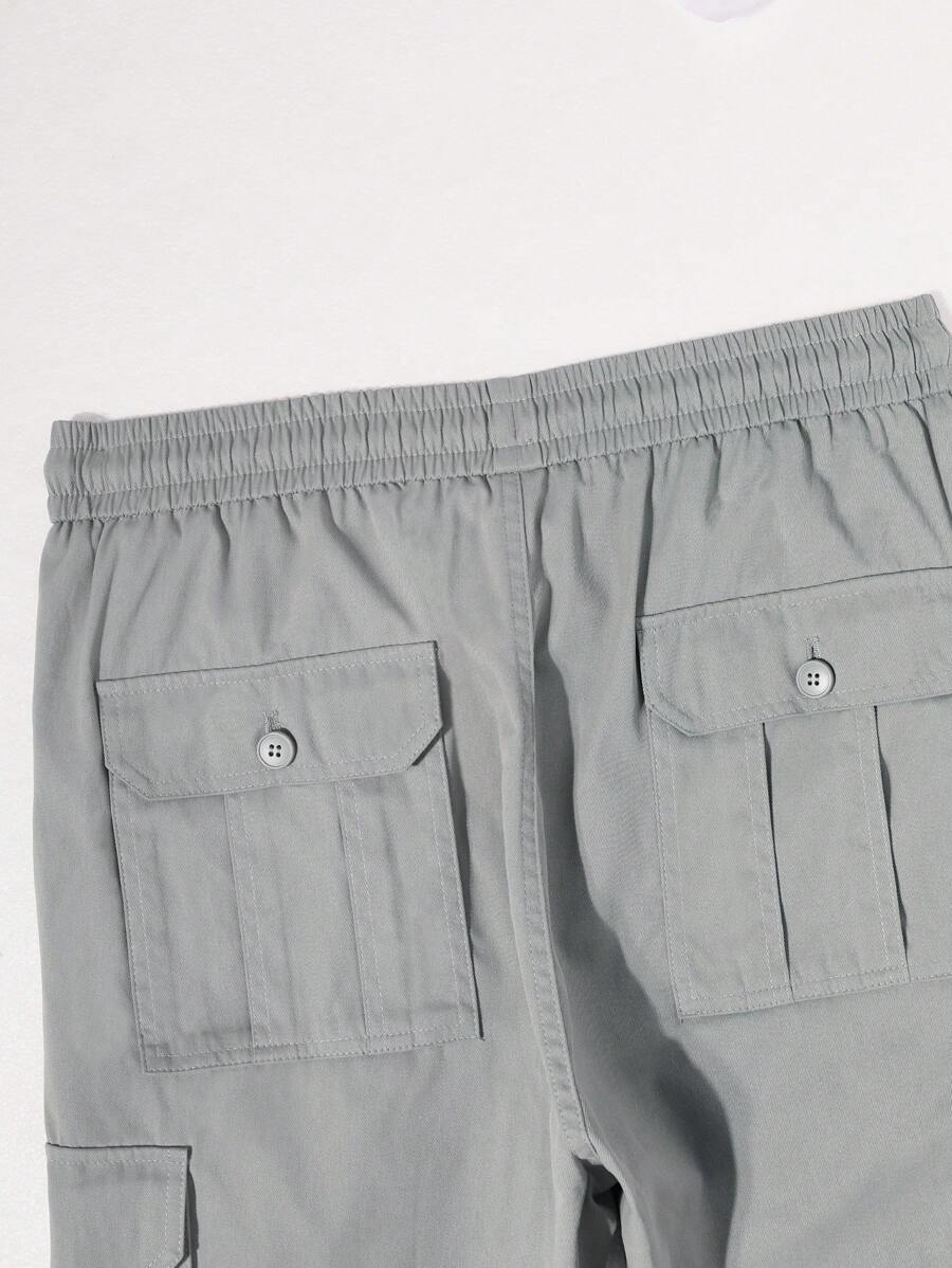 Pantalon cargo ample et décontracté avec cordon de serrage à la taille et poches à rabat