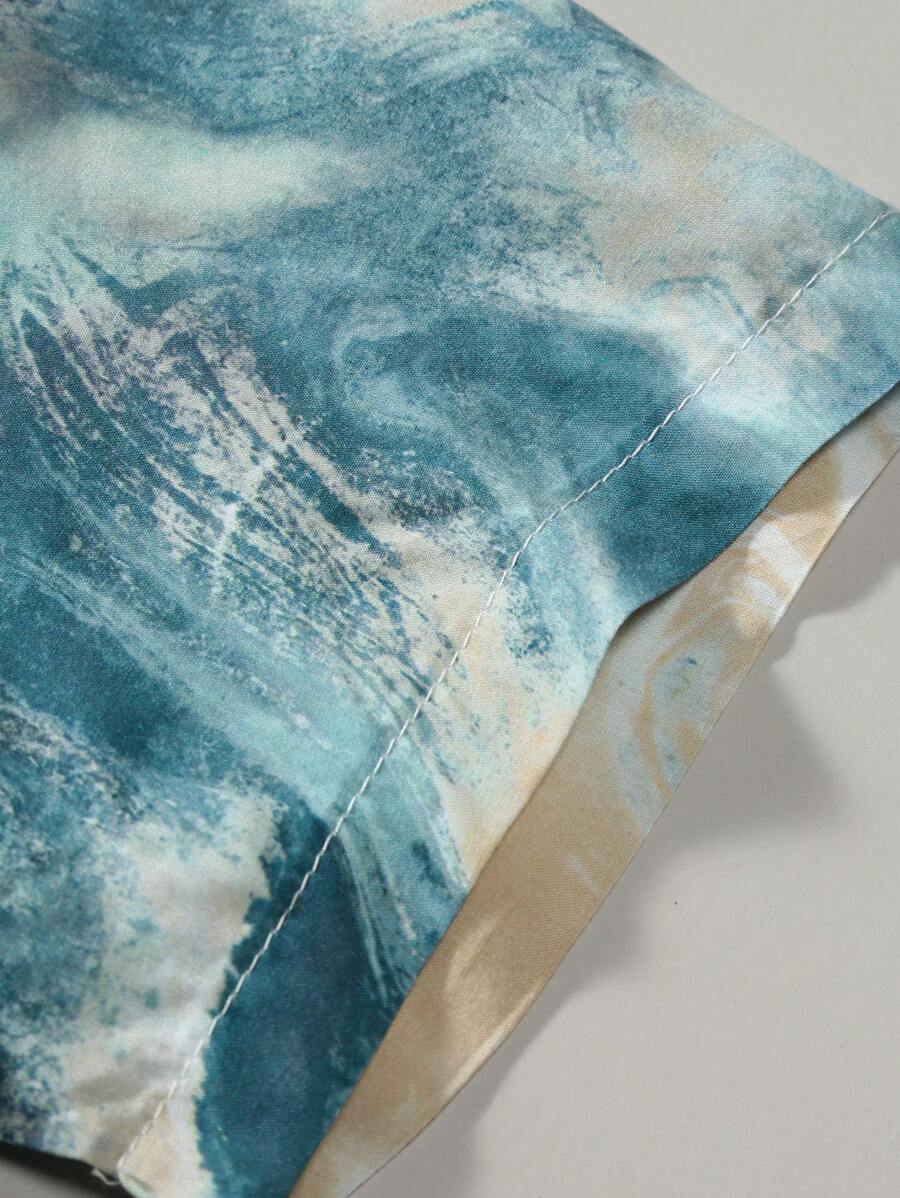 Chemise hawaïenne boutonnée à manches courtes et imprimé sur toute la surface