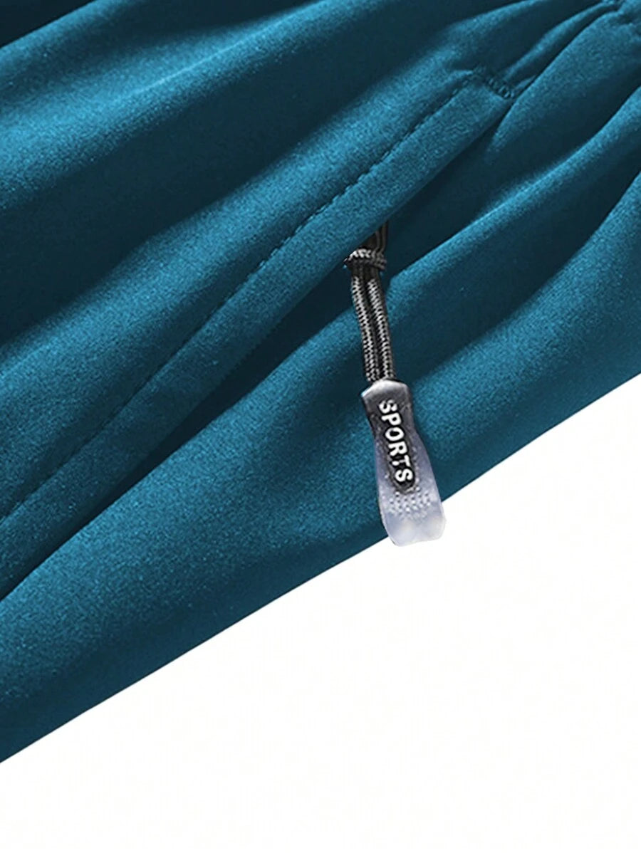 Shorts de sport taille élastique avec poches zippées et cordon