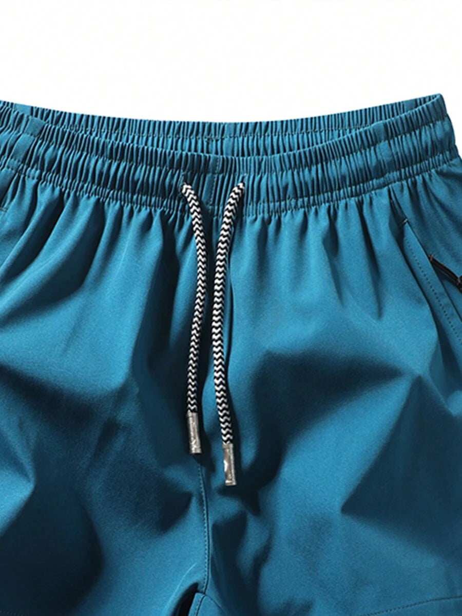 Shorts de sport taille élastique avec poches zippées et cordon