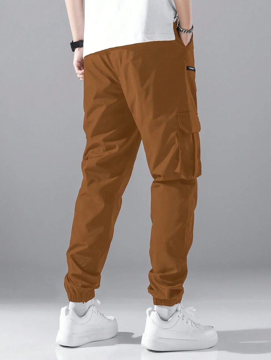 Pantalon cargo ample avec poches à rabat et cordons de serrage pour homme