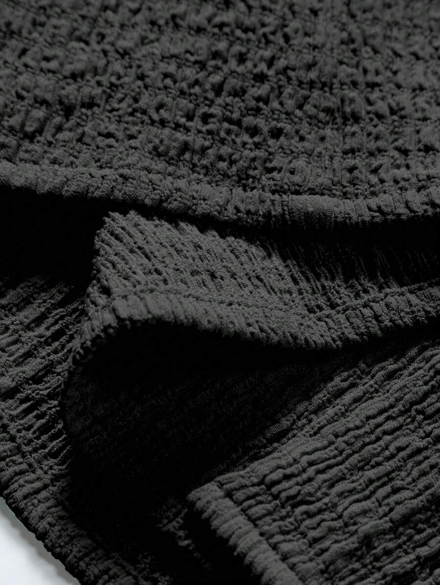 Chemise boutonnée texturée plissée en tricot de style décontracté pour hommes