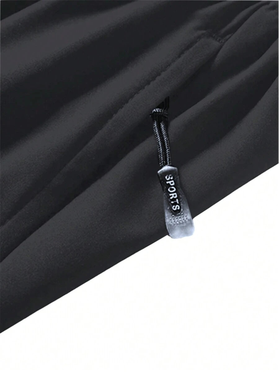 Shorts de sport taille élastique avec poches zippées et cordon