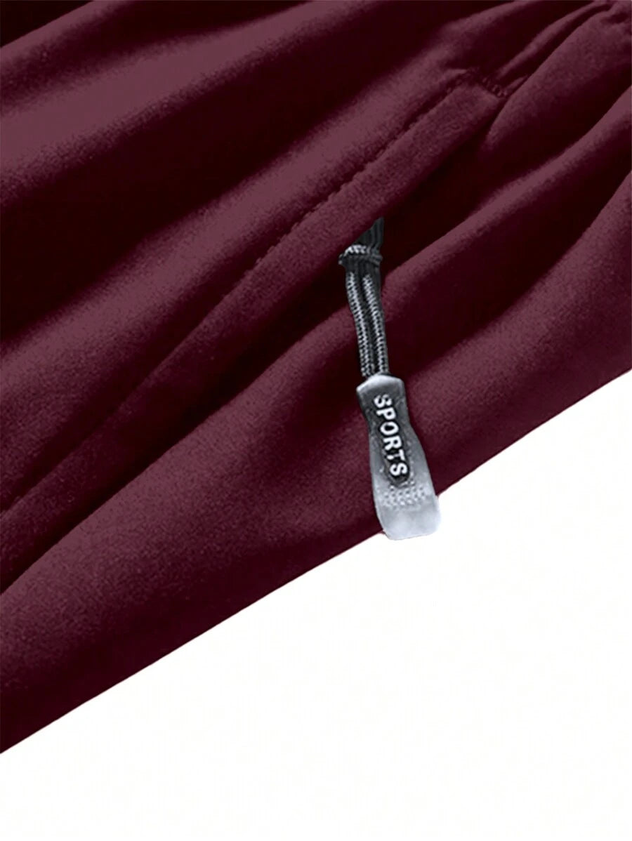 Shorts de sport taille élastique avec poches zippées et cordon