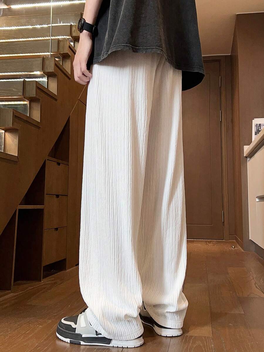 Pantalon droit décontracté en tissu froissé de couleur unie pour homme