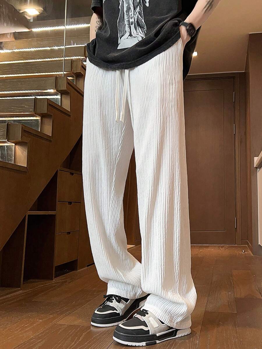 Pantalon droit décontracté en tissu froissé de couleur unie pour homme