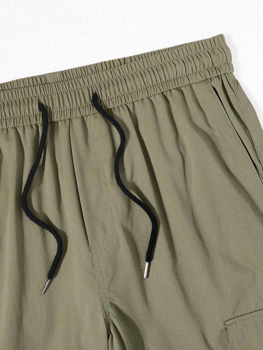 Pantalon cargo ample et décontracté avec cordon de serrage à la taille et poches à rabat