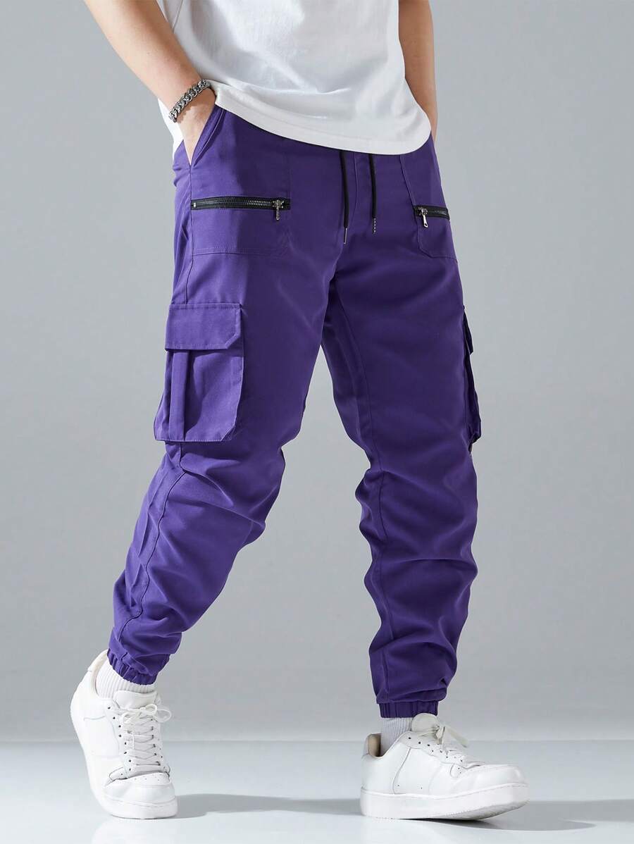 Pantalon cargo ample avec poches à rabat et cordons de serrage pour homme