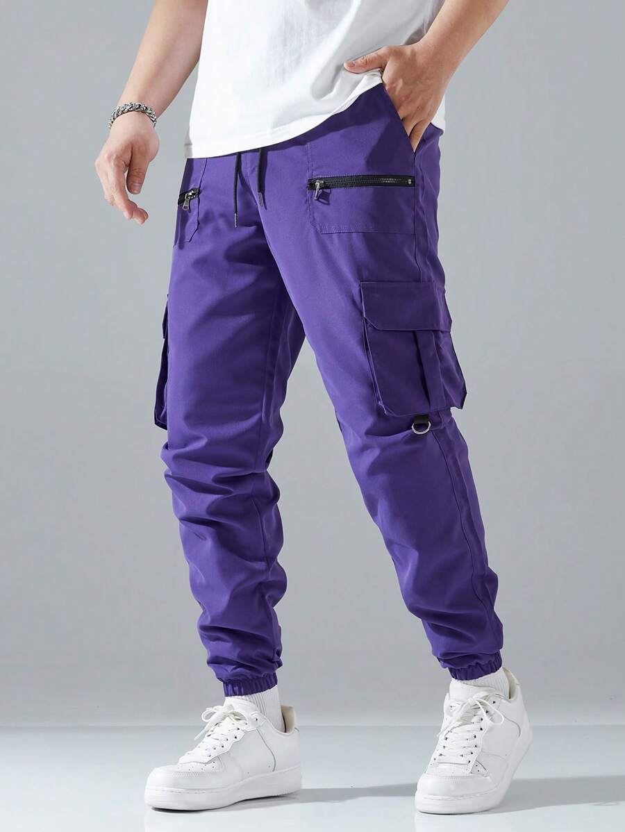 Pantalon cargo ample avec poches à rabat et cordons de serrage pour homme