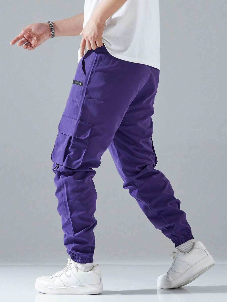 Pantalon cargo ample avec poches à rabat et cordons de serrage pour homme