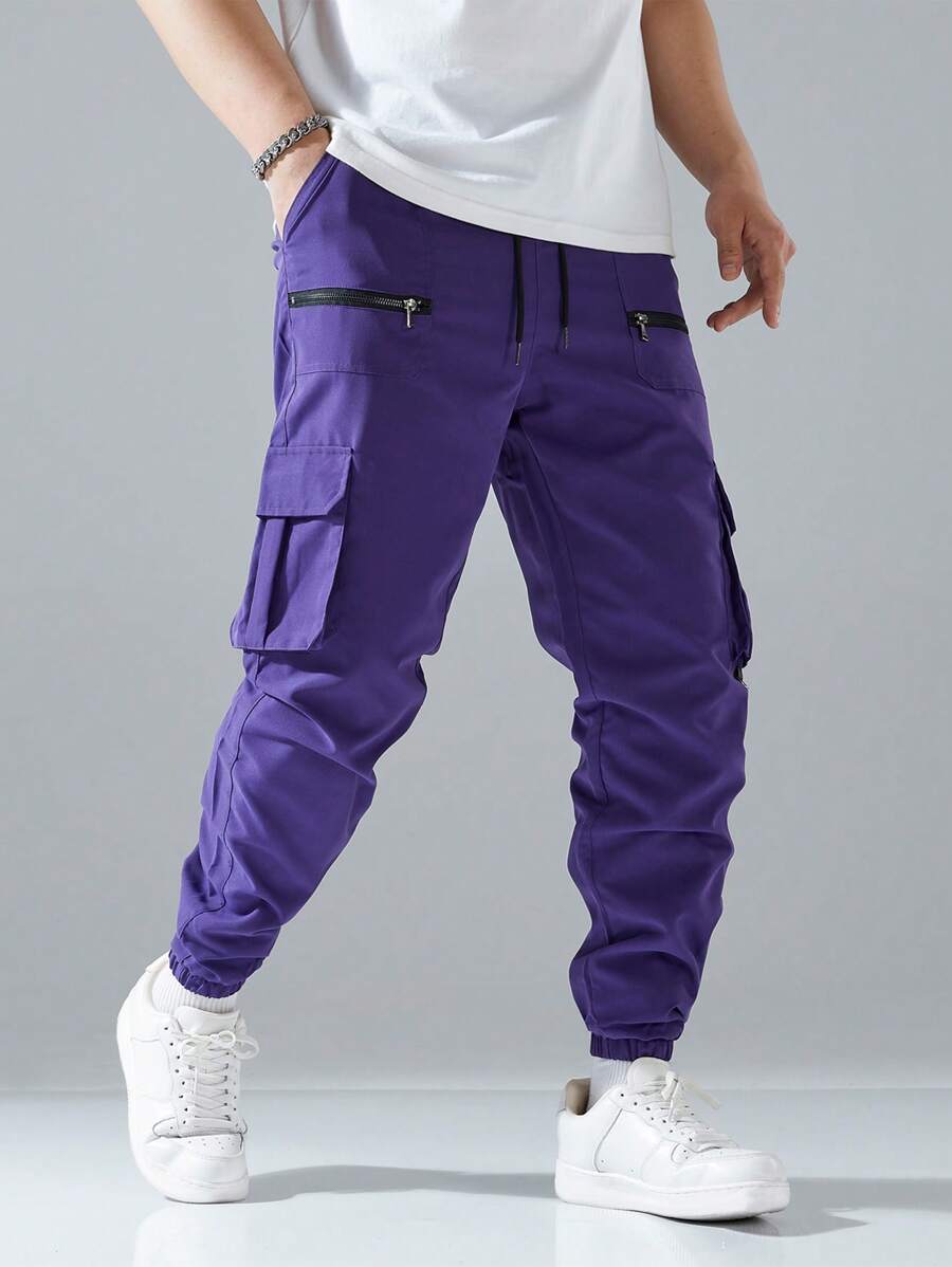 Pantalon cargo ample avec poches à rabat et cordons de serrage pour homme
