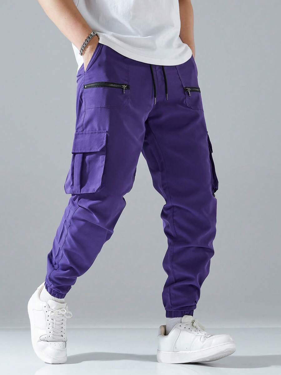 Pantalon cargo ample avec poches à rabat et cordons de serrage pour homme