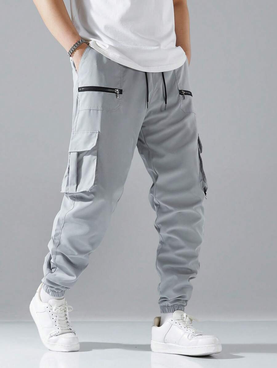 Pantalon cargo ample avec poches à rabat et cordons de serrage pour homme