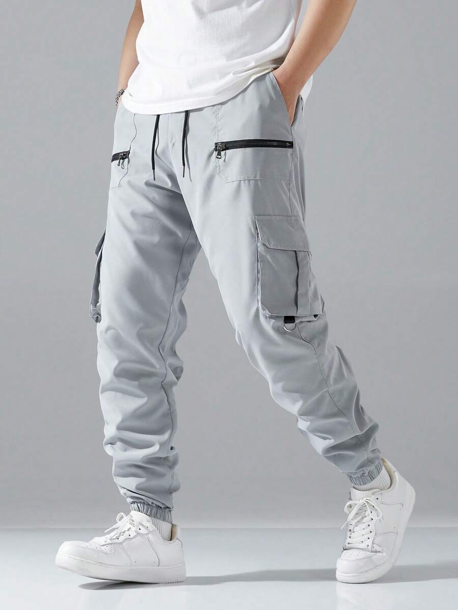 Pantalon cargo ample avec poches à rabat et cordons de serrage pour homme