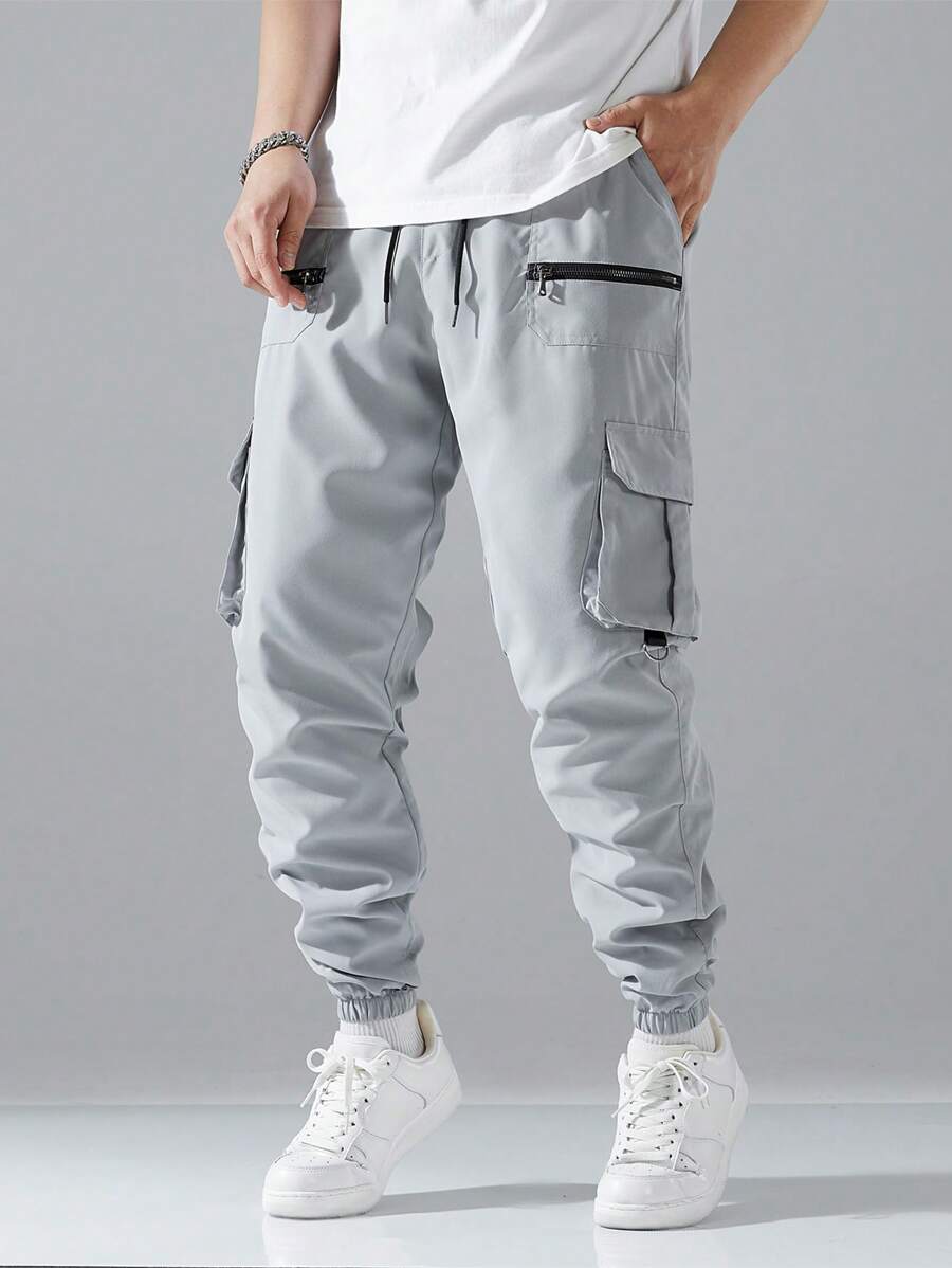 Pantalon cargo ample avec poches à rabat et cordons de serrage pour homme