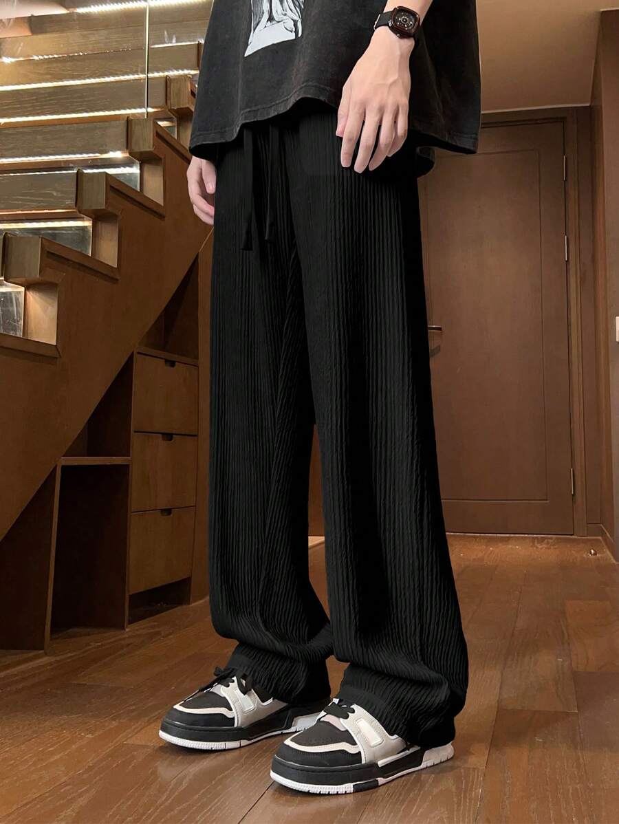 Pantalon droit décontracté en tissu froissé de couleur unie pour homme