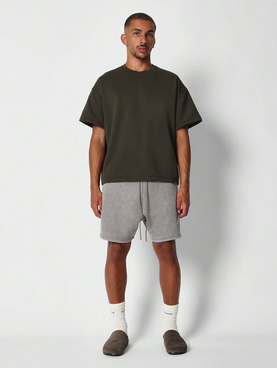 Bermuda athlétique taille haute à entrejambe bas – Style détente pour homme