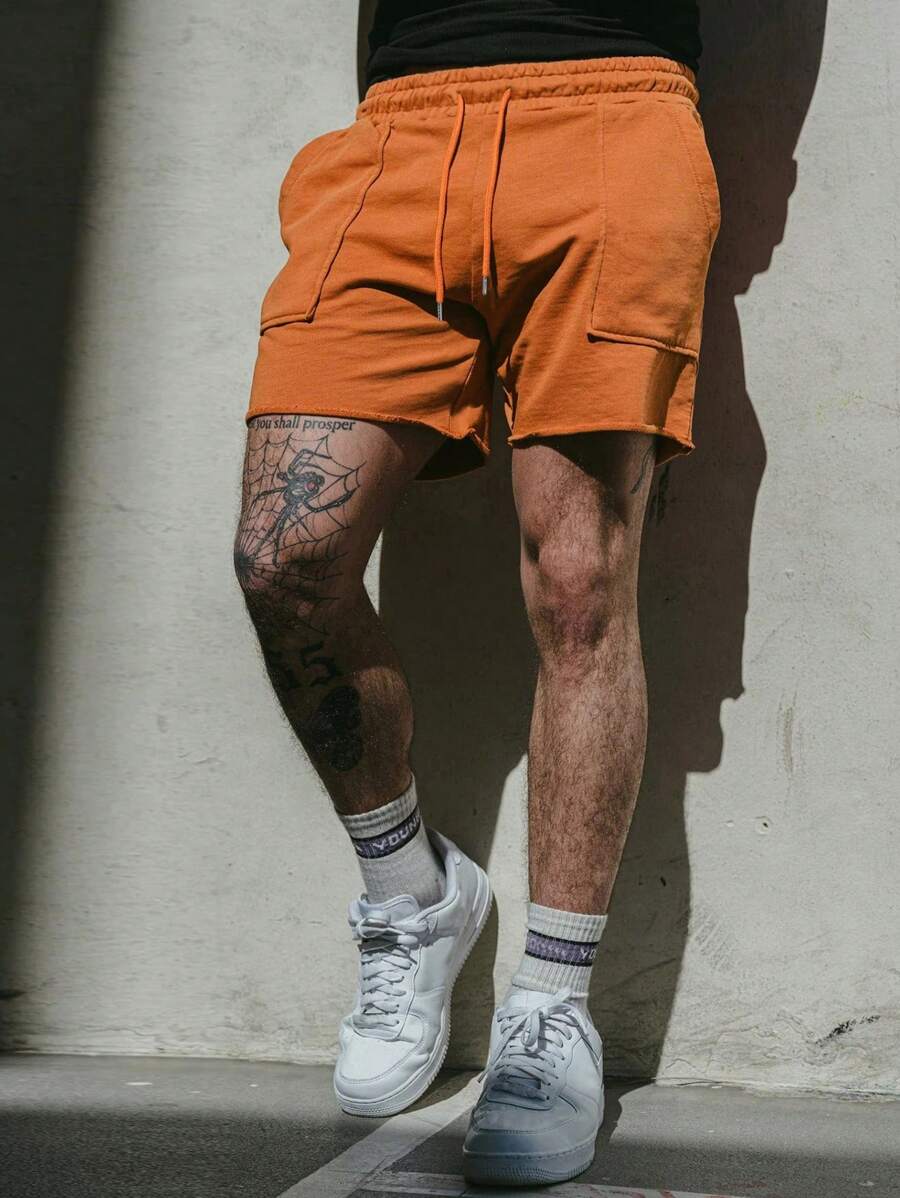 Short de sport pour homme avec cordon de serrage et poches pratiques