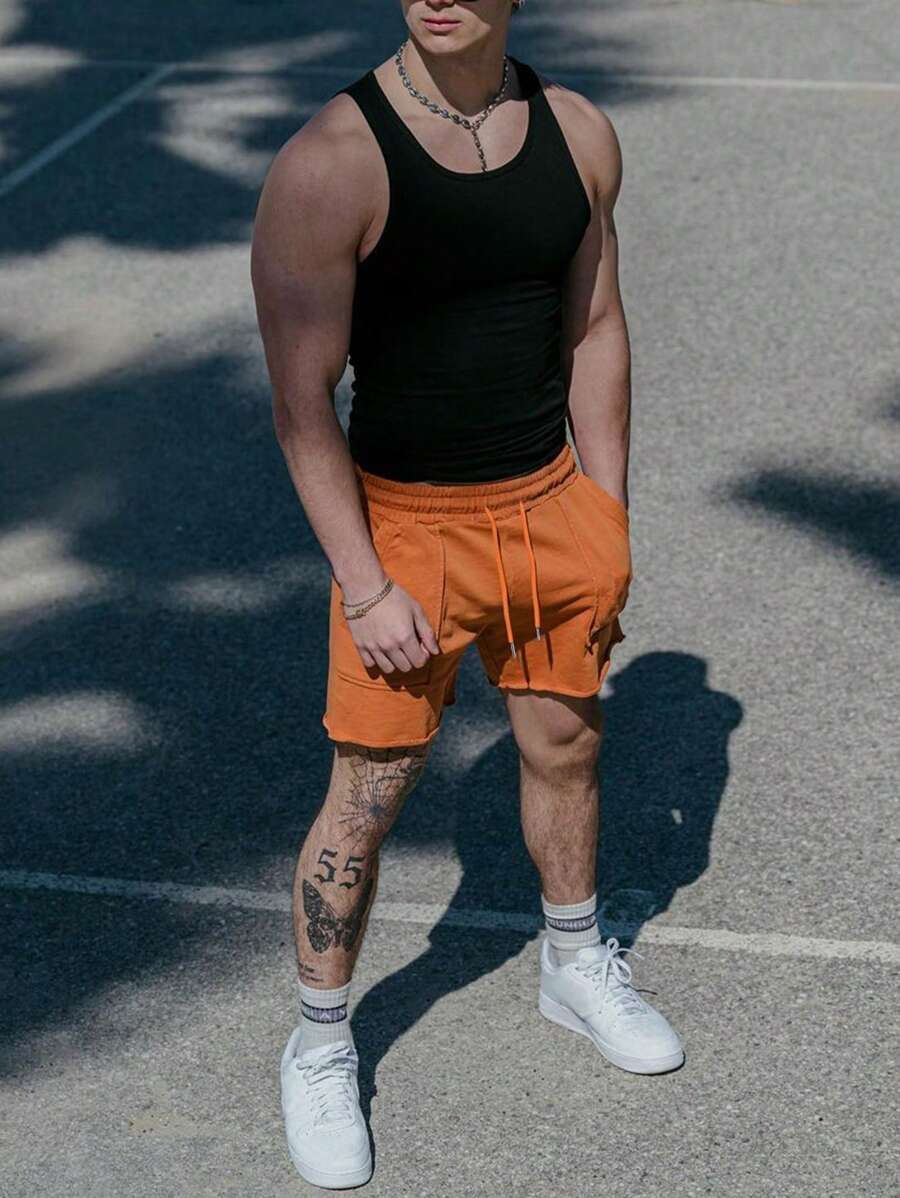 Short de sport pour homme avec cordon de serrage et poches pratiques