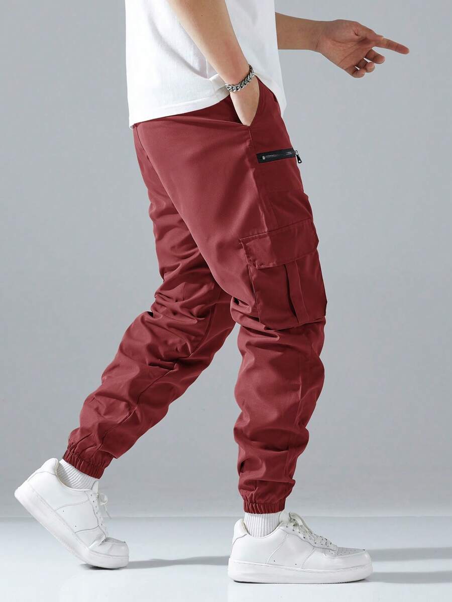 Pantalon cargo ample avec poches à rabat et cordons de serrage pour homme