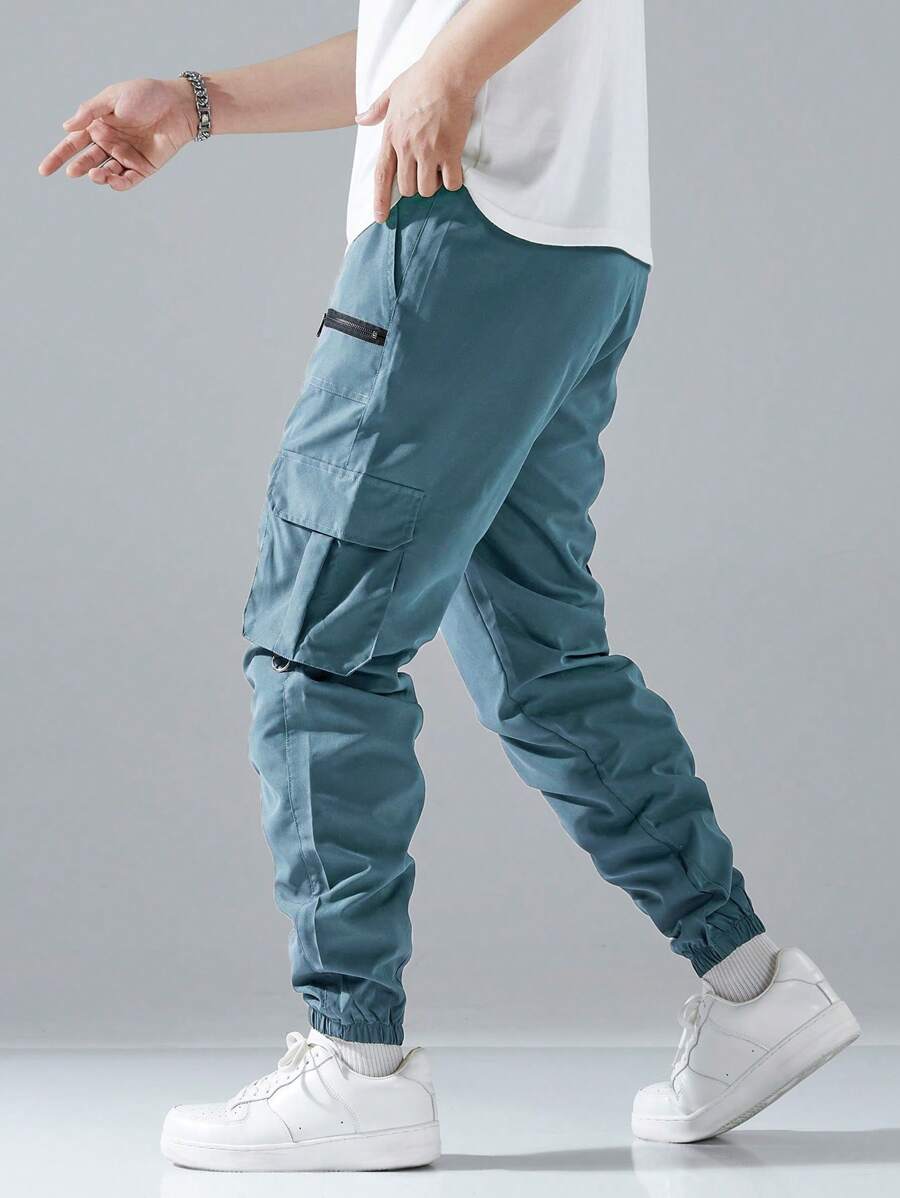 Pantalon cargo ample avec poches à rabat et cordons de serrage pour homme