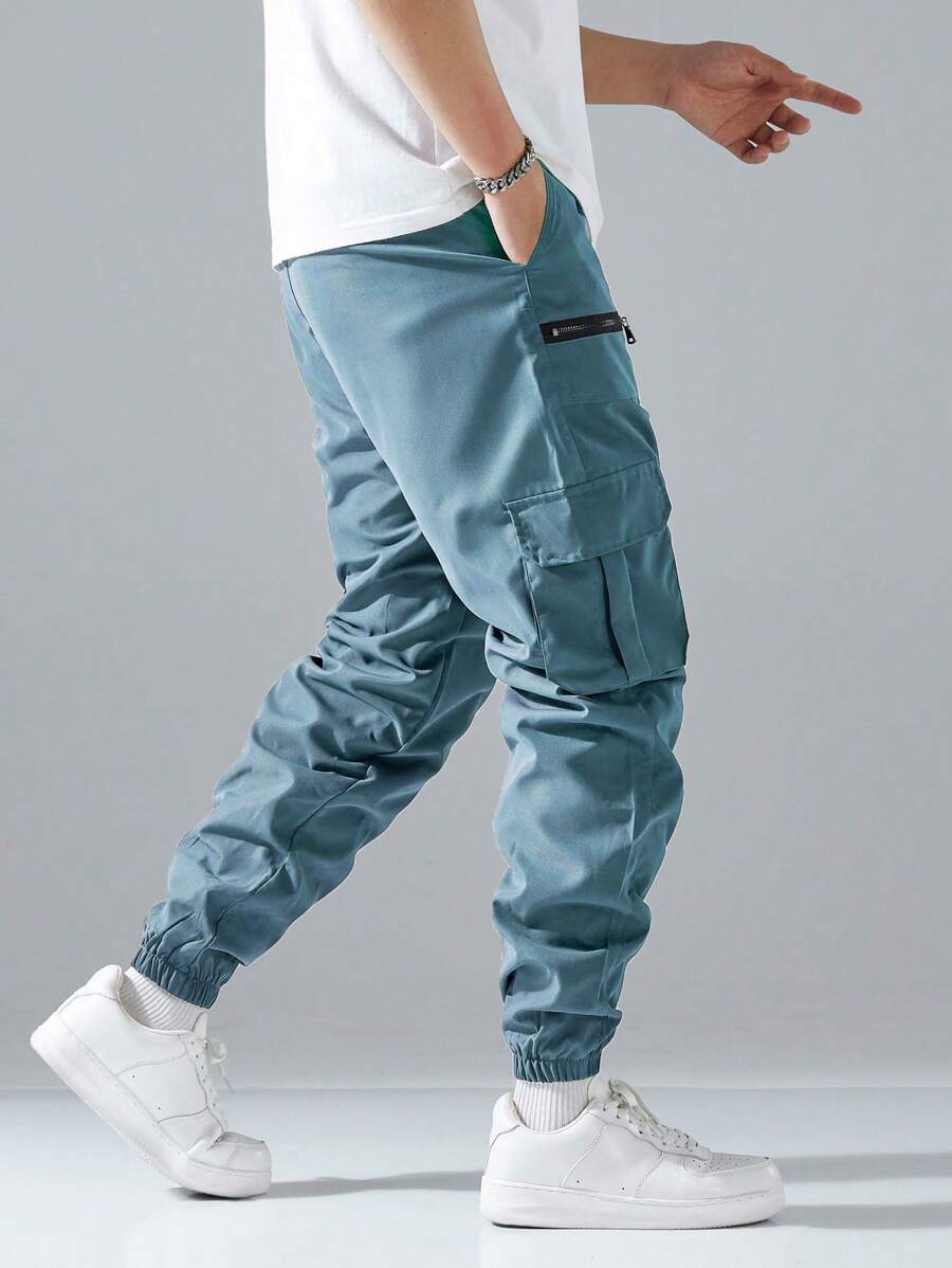 Pantalon cargo ample avec poches à rabat et cordons de serrage pour homme