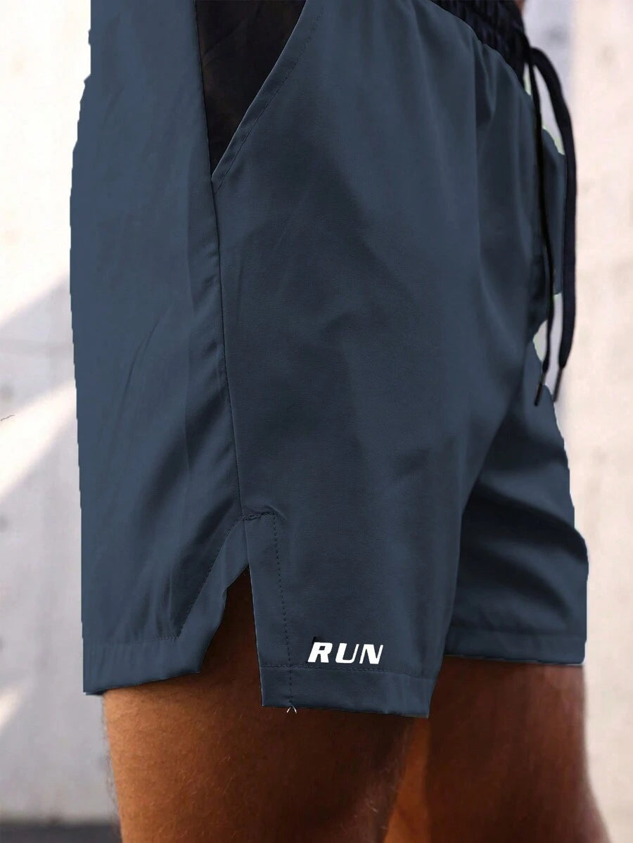 Shorts de sport avec taille élastique, poches larges et inscription