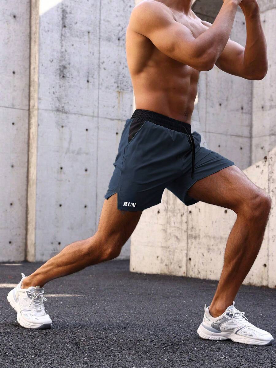 Shorts de sport avec taille élastique, poches larges et inscription