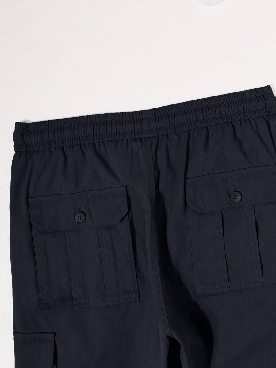 Pantalon cargo ample et décontracté avec cordon de serrage à la taille et poches à rabat