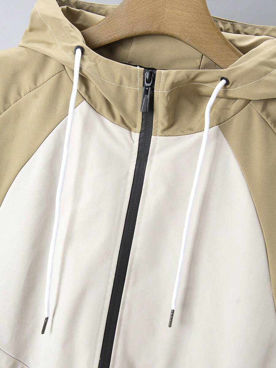 Veste coupe-vent patchwork à capuche grande taille avec fermeture éclair sur le devant