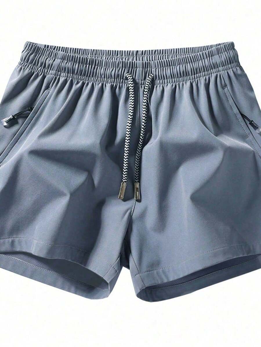 Shorts de sport taille élastique avec poches zippées et cordon