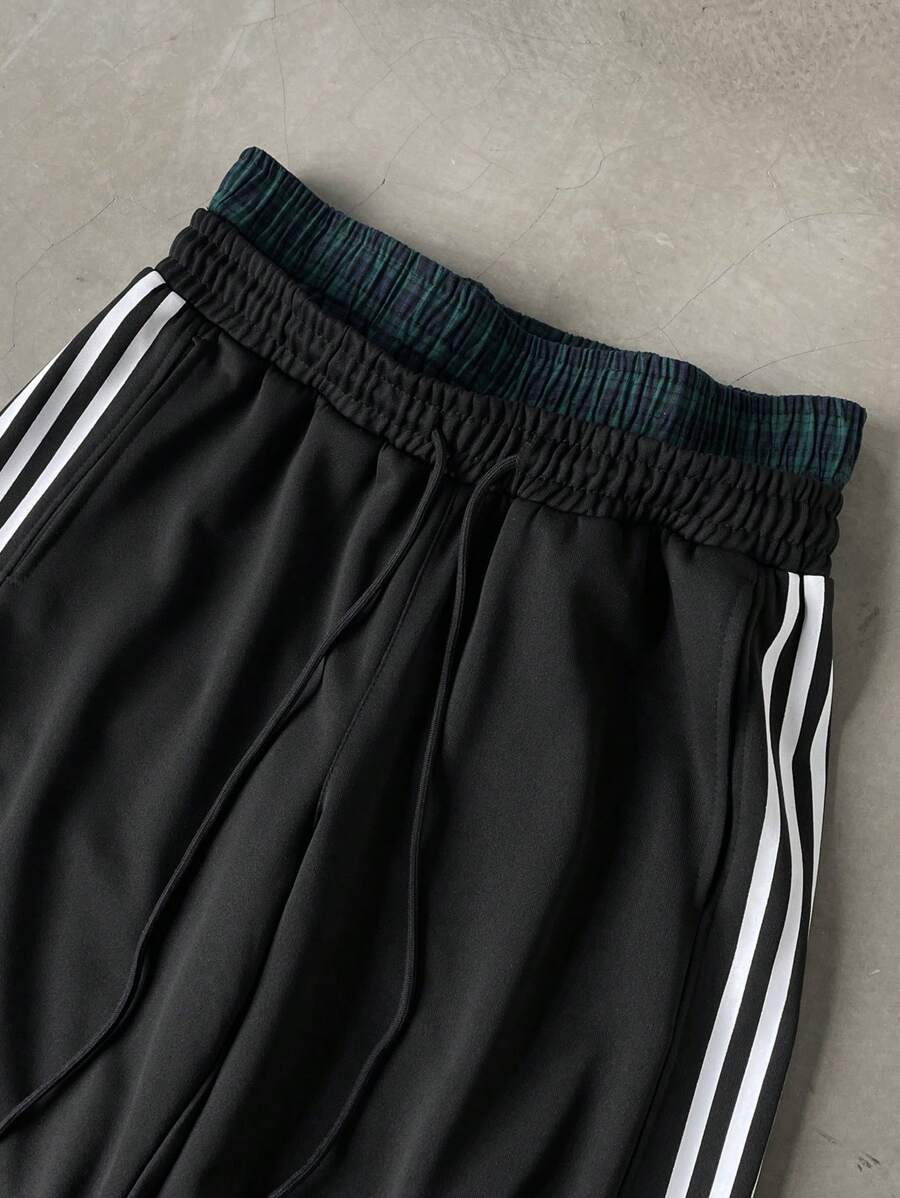Pantalon de survêtement à rayures et jambes larges avec ceinture double épaisseur