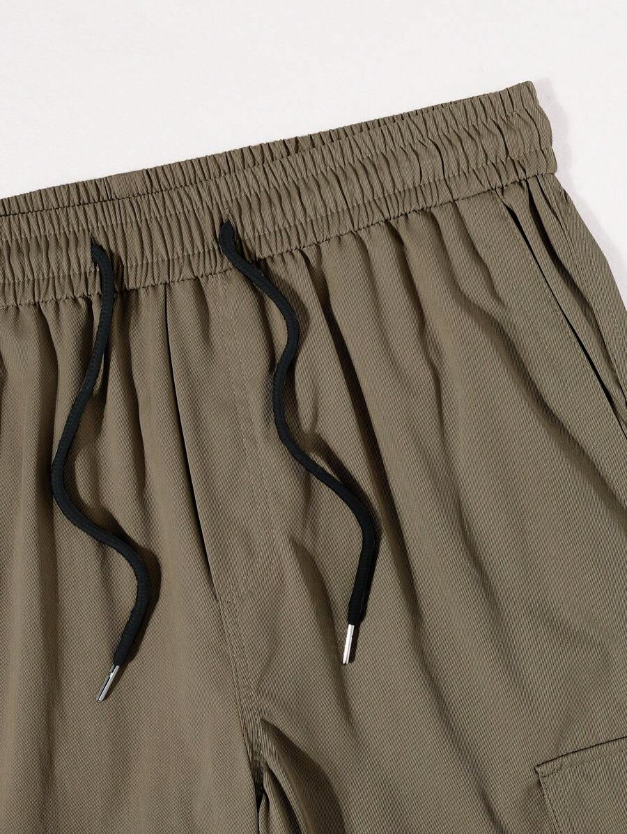 Pantalon cargo ample et décontracté avec cordon de serrage à la taille et poches à rabat