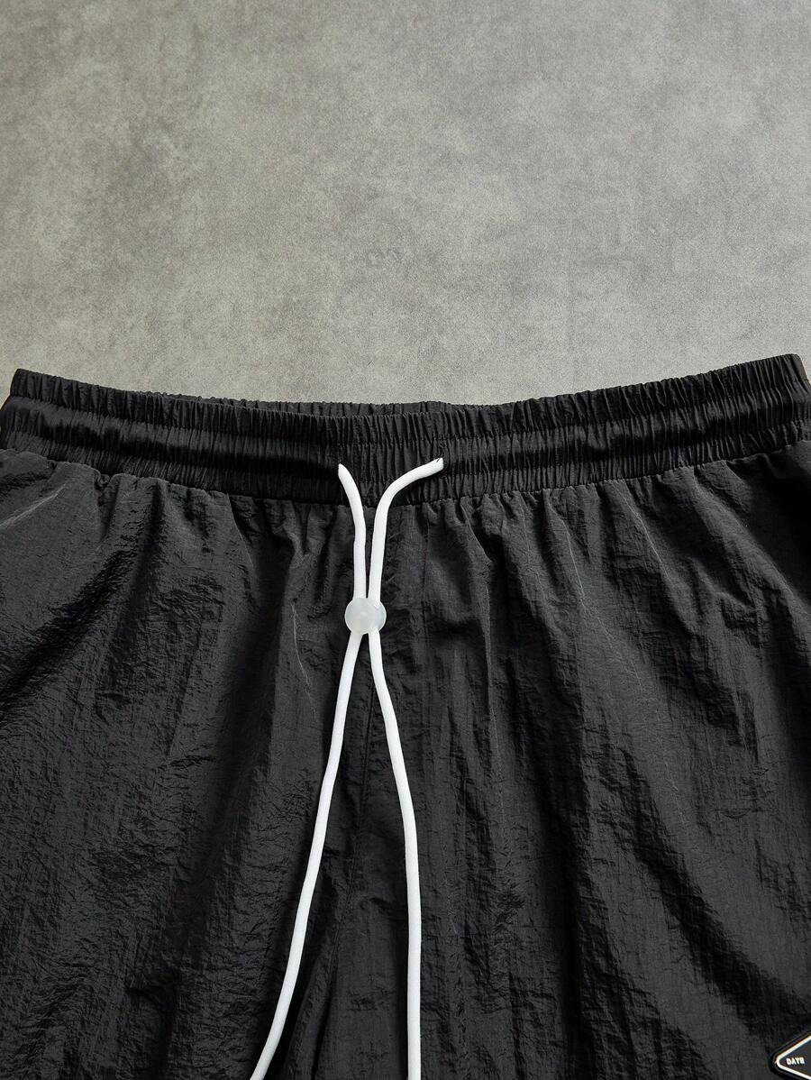 Pantalon de survêtement à séchage rapide et blocs de couleurs pour hommes