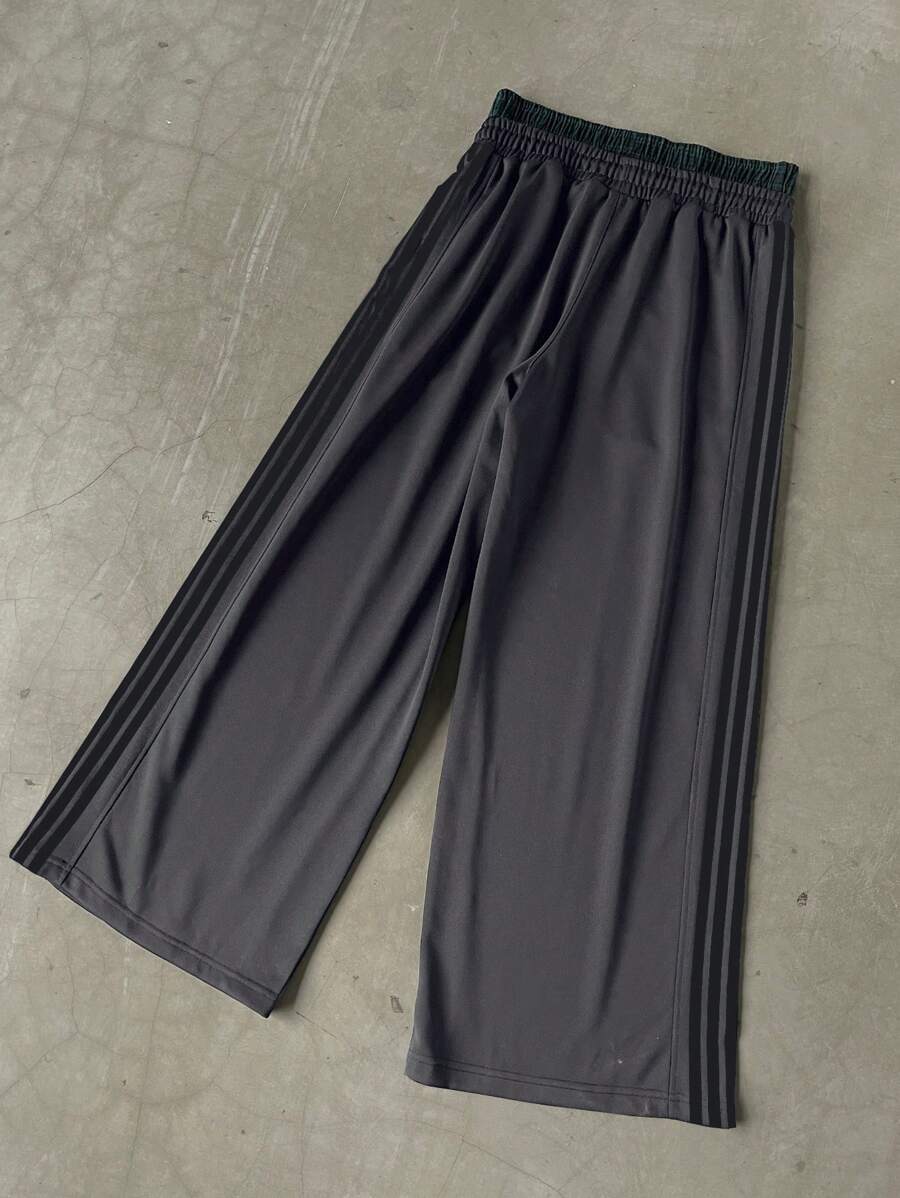 Pantalon de survêtement à rayures et jambes larges avec ceinture double épaisseur