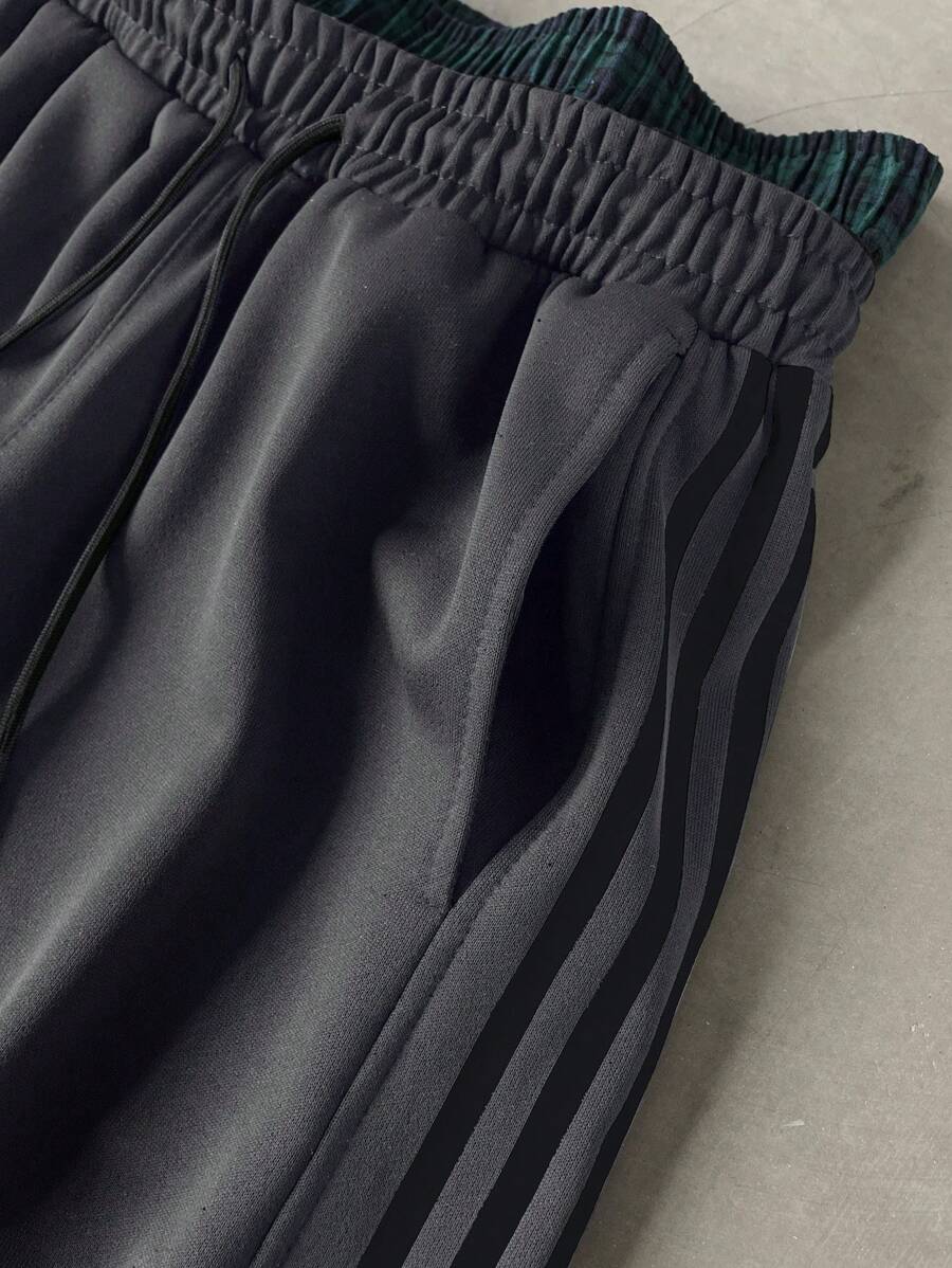 Pantalon de survêtement à rayures et jambes larges avec ceinture double épaisseur