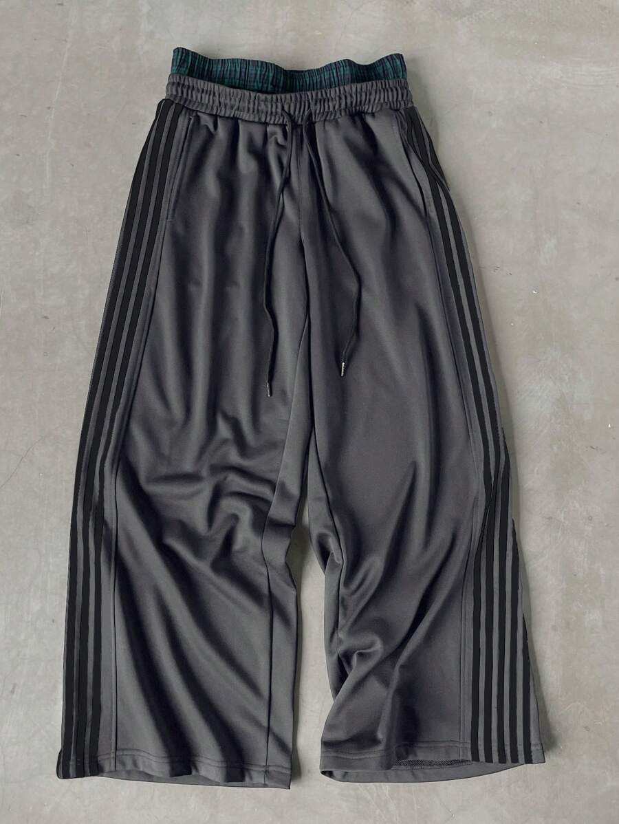 Pantalon de survêtement à rayures et jambes larges avec ceinture double épaisseur