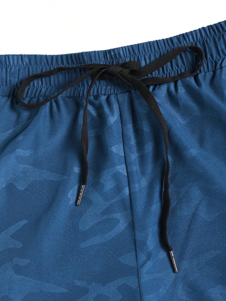 Shorts de sport à taille élastique imprimé lettre et cordon stylé