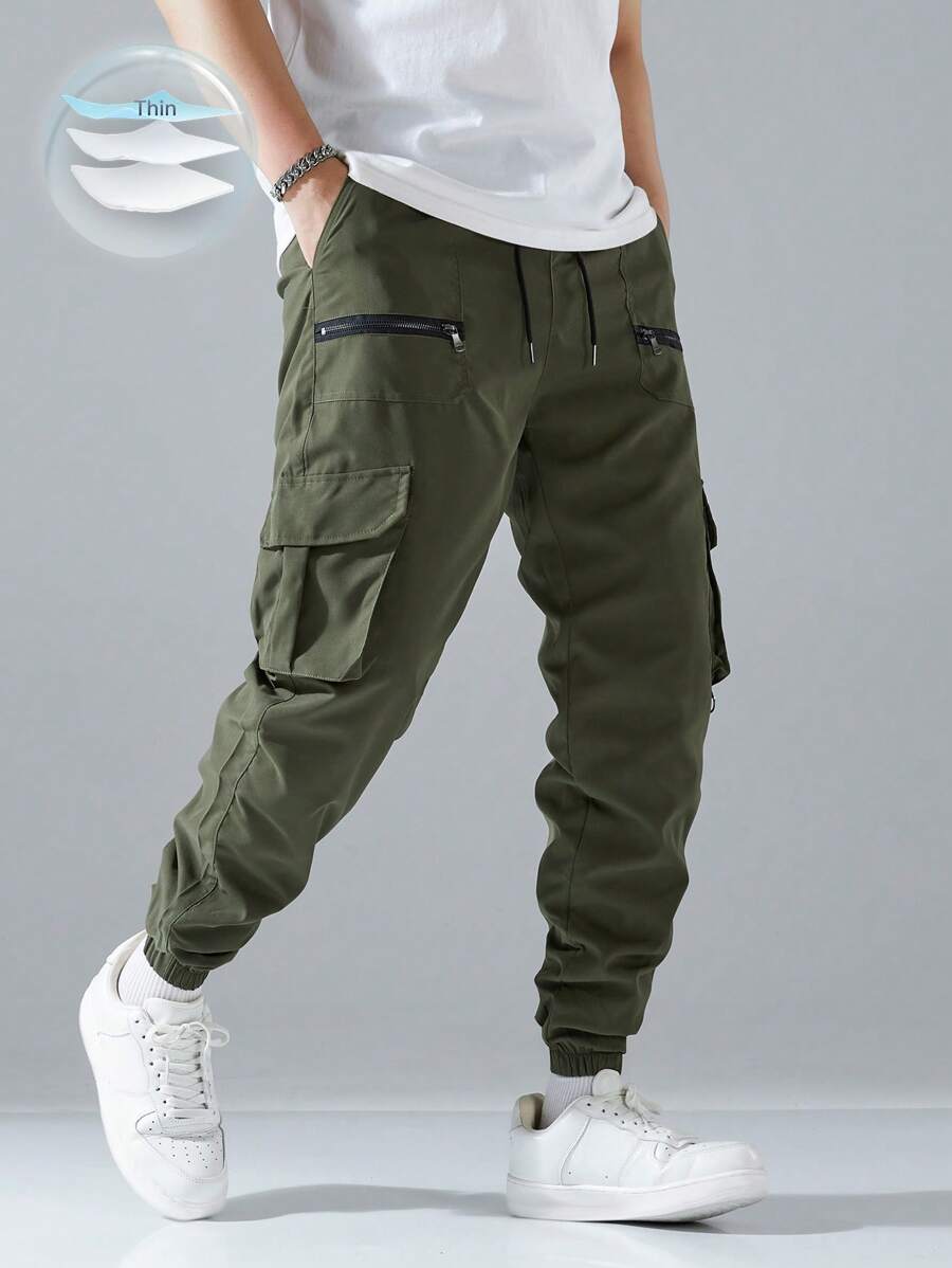 Pantalon cargo ample avec poches à rabat et cordons de serrage pour homme