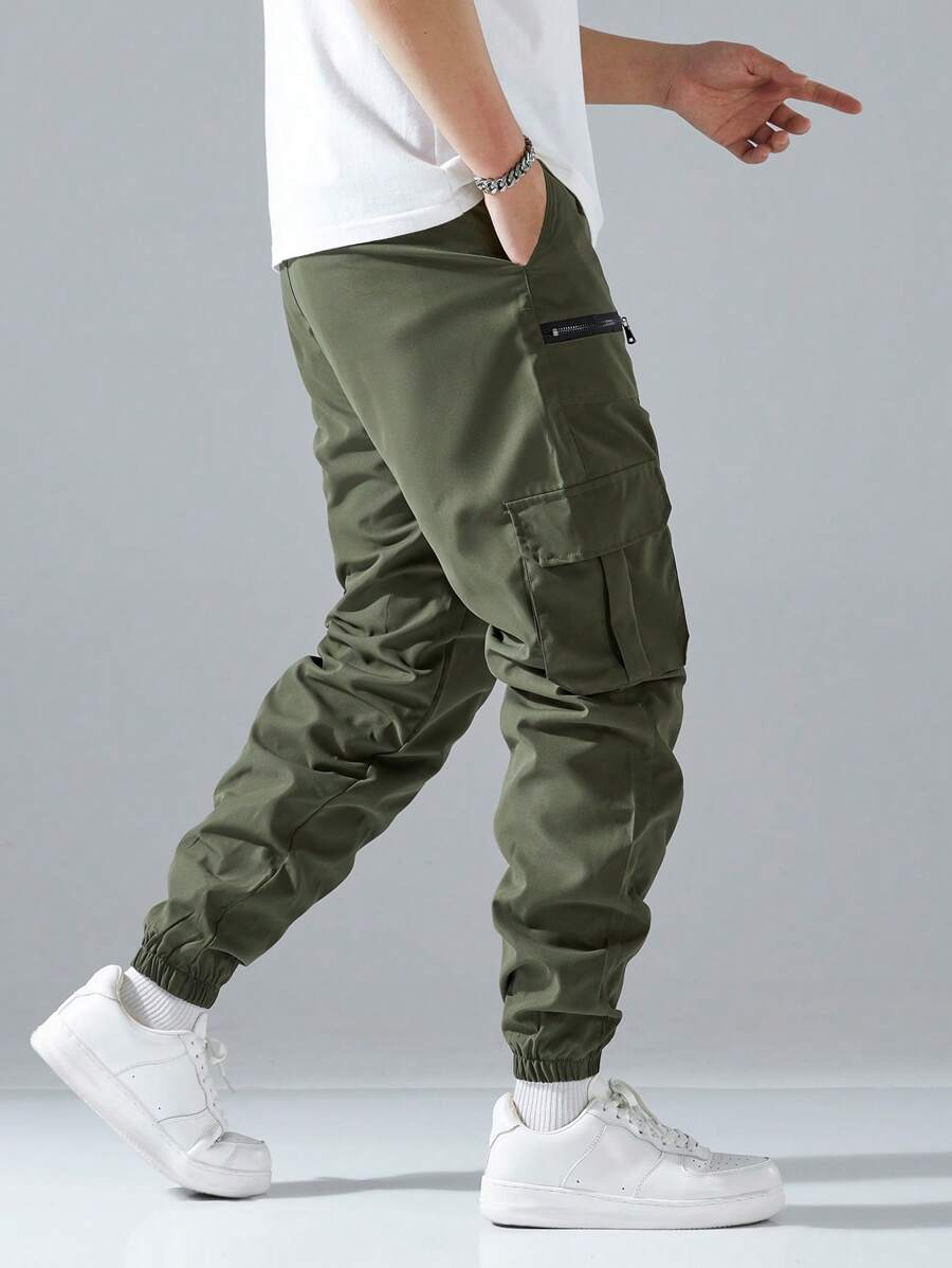 Pantalon cargo ample avec poches à rabat et cordons de serrage pour homme