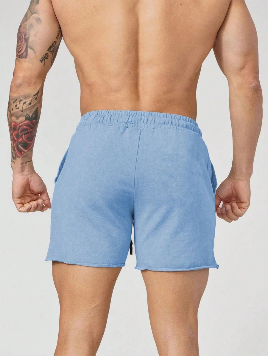 Short de sport pour homme avec cordon de serrage et poches pratiques