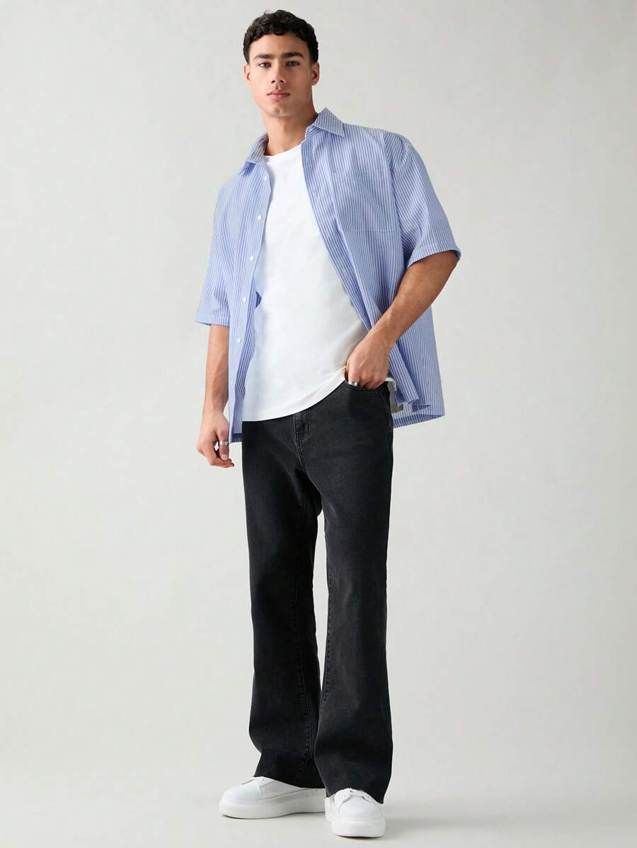 Chemise boutonnée à manches courtes et rayures tissées avec poche poitrine